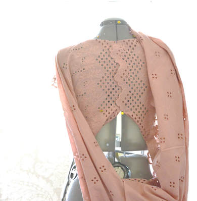draping eyelet fabric on a dress form