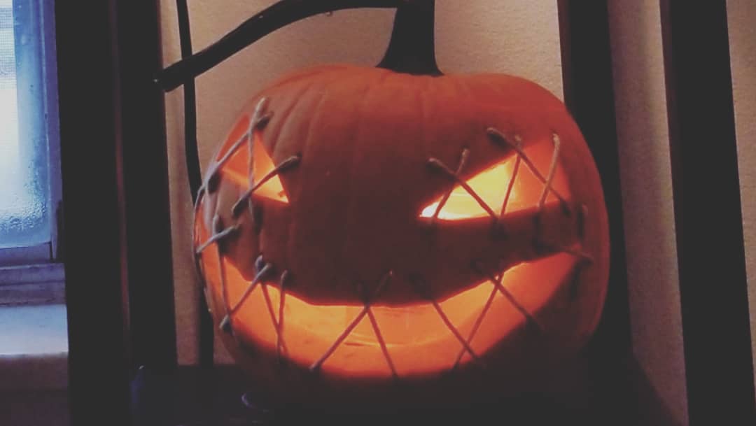 stitched jack o lantern sewn mouth shut pumpkin