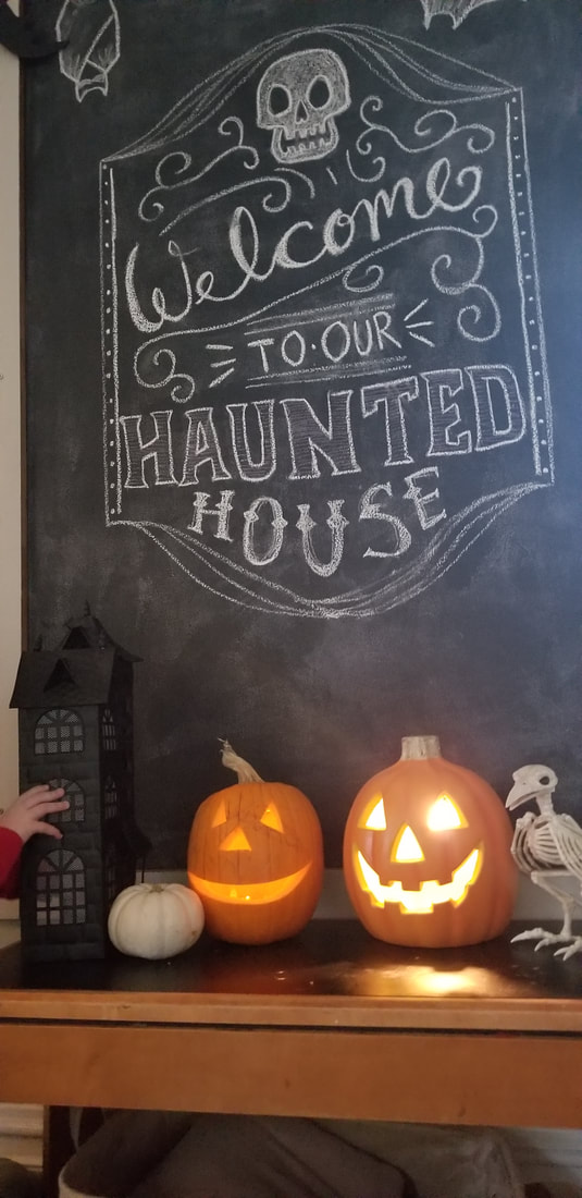 chalk wall drawing welcome to our haunted house halloween