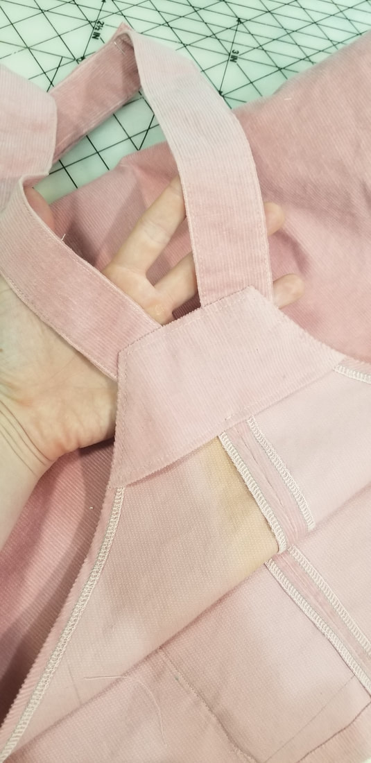 pink corduroy overalls