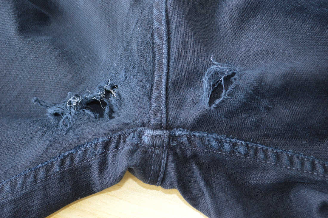 Repairing my husbands holey jeans with invisible denim mending