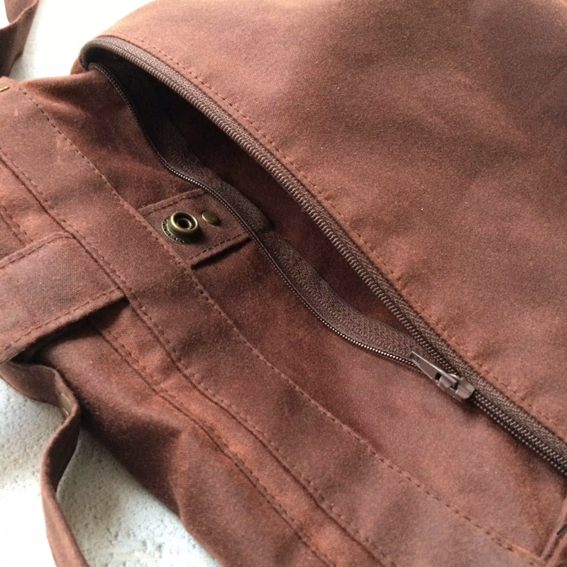 adding in a back zipper pocket