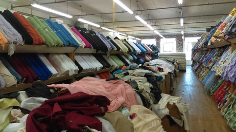 getting slightly messier at textile discount outlet