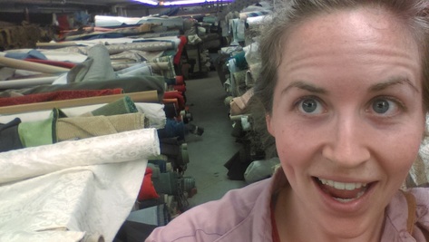 selfie with the fabric in the basement at textile discount outlet