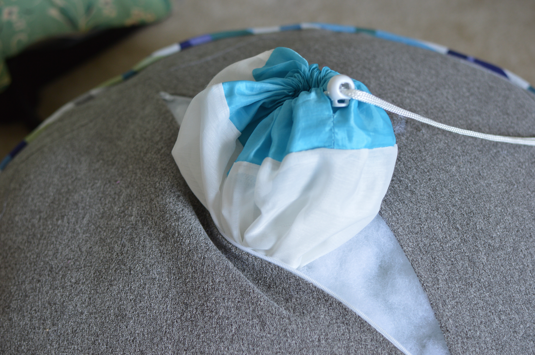 sewn pouf filled with sewing scraps